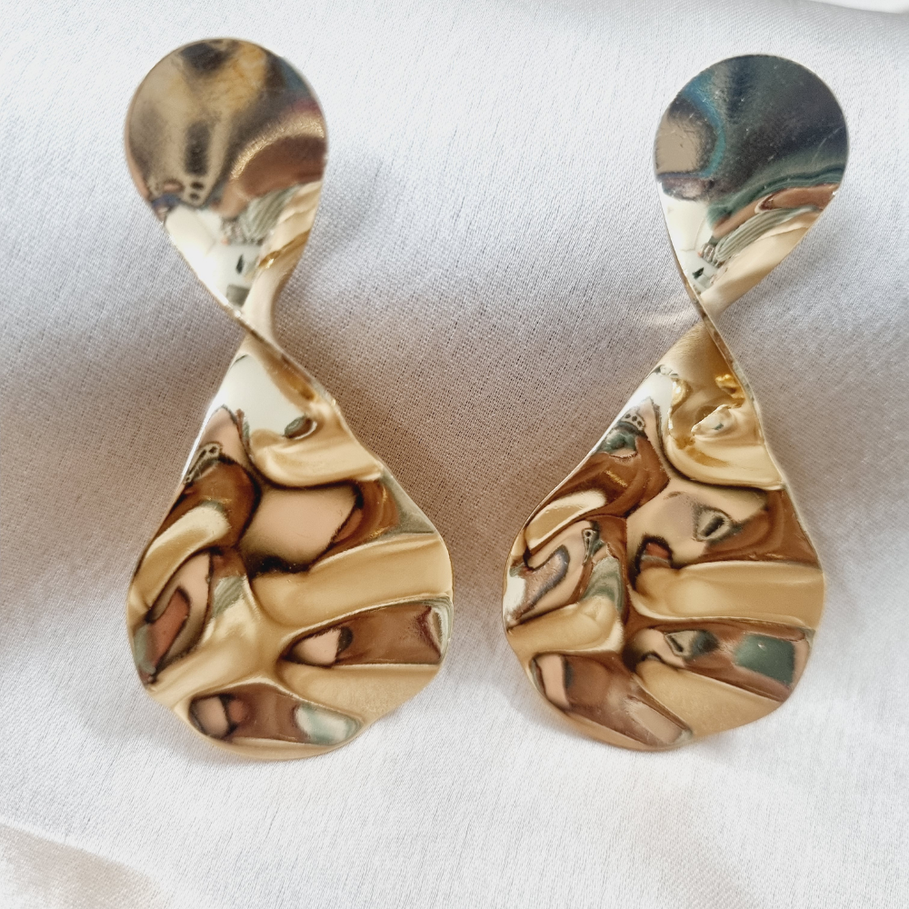 Asymetrical party wear golden Stud Earring